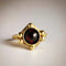 Gold ring with red crystal in vintage style