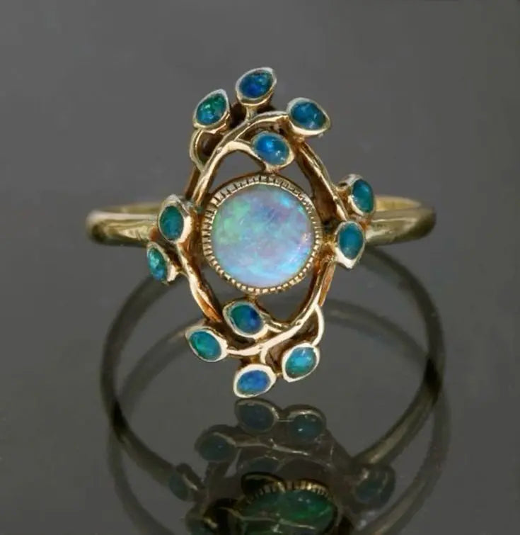 Blue ring with vintage crystals and opal