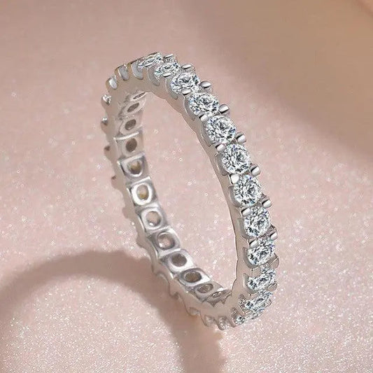 Silver ring with zircons