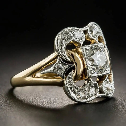 Gold ring with zircons in vintage style