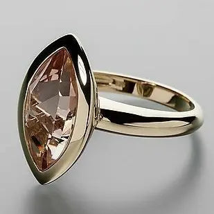 Gold ring made of oval glass