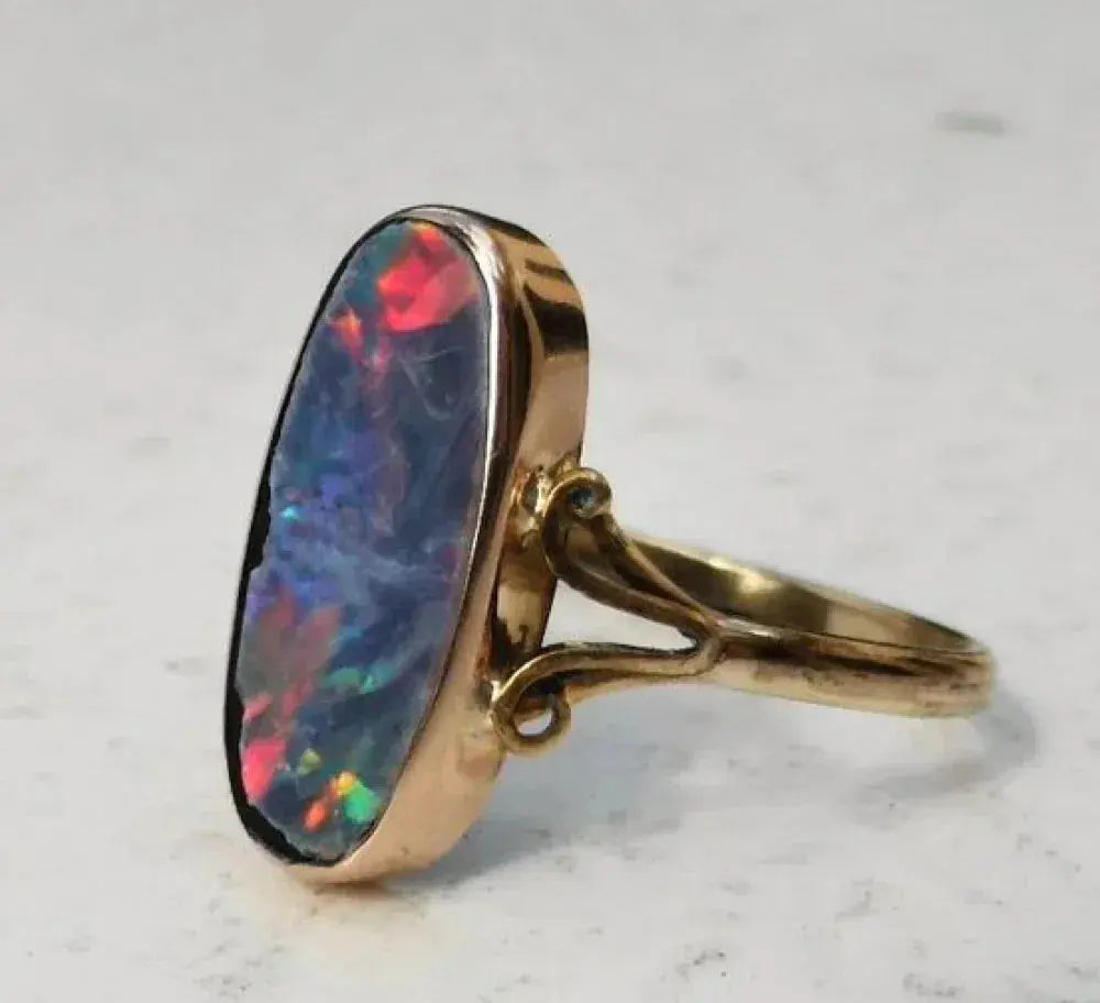 Ring with colored opal in vintage style