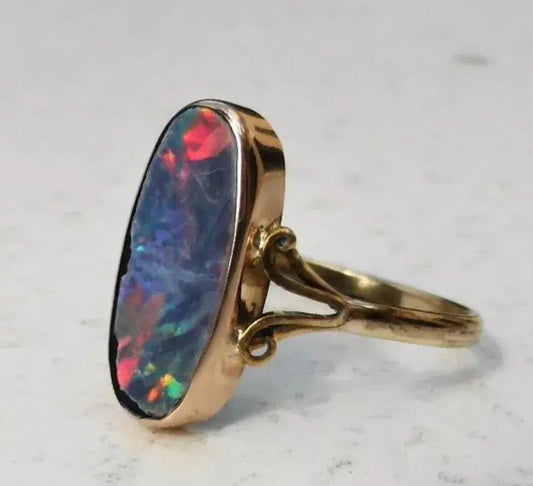 Ring with colored opal in vintage style
