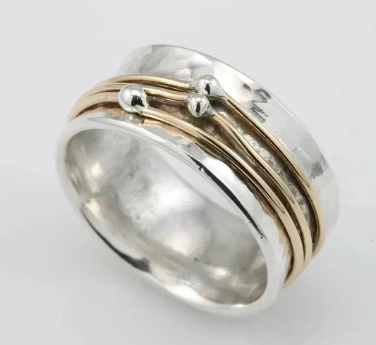 Silver ring with a layer of gold